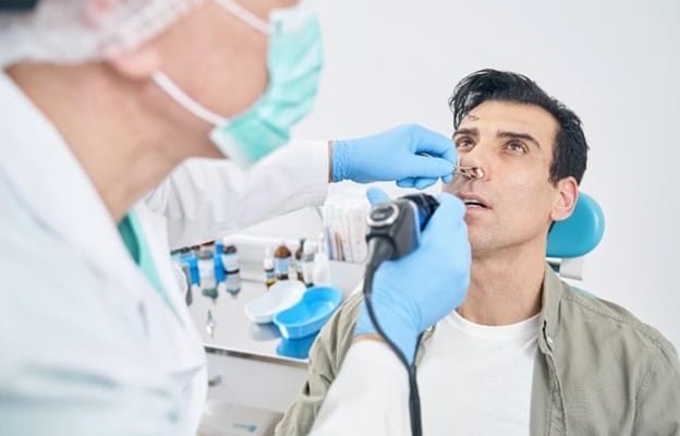 Patient undergoing nasal endoscopy